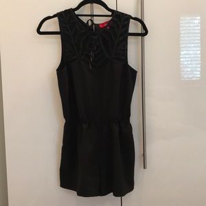 Brand new romper with mesh front